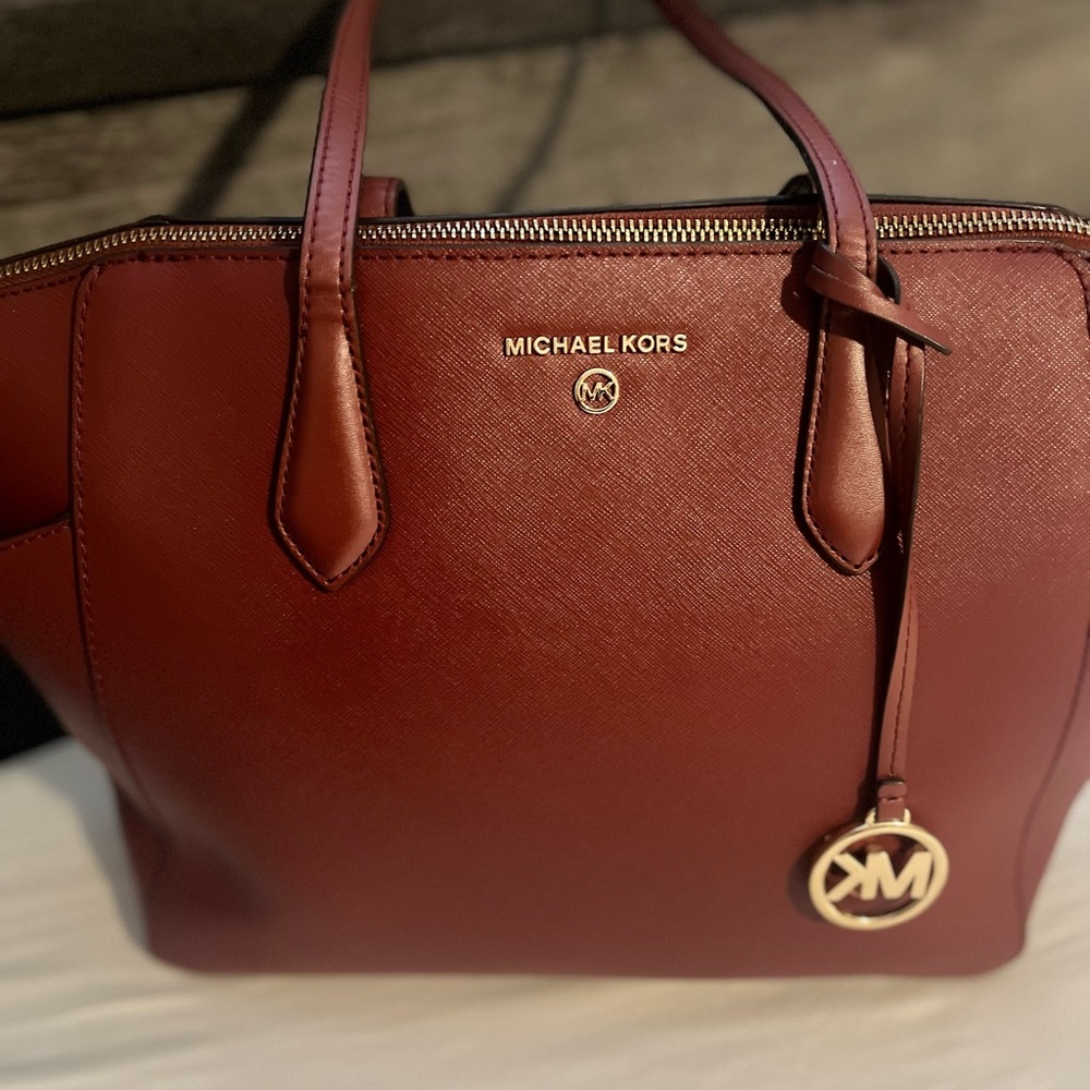 AUTHENTIC Michael Kors orange-reddish in color tote Bag.